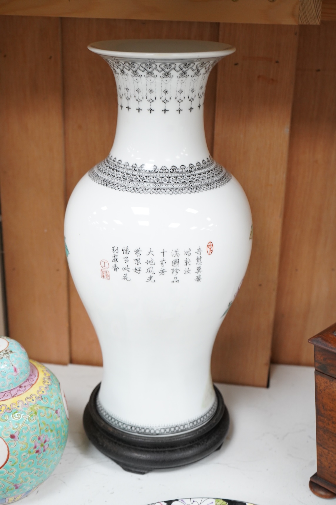 A collection of Chinese ceramics to include enamelled ginger jar and cover, floral plate and a vase, largest 40cm high